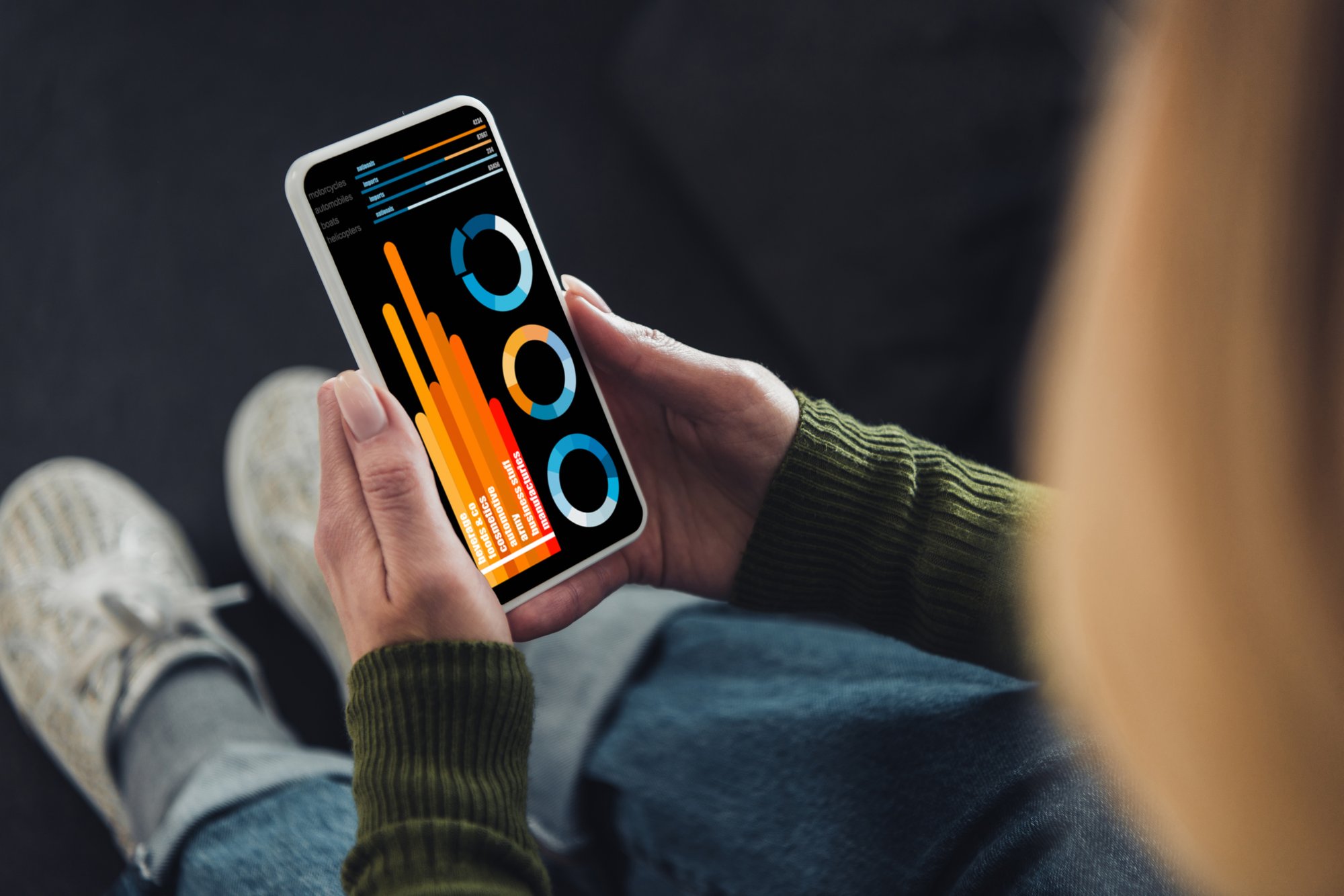 cropped-view-of-woman-holding-smartphone-with-char-2024-11-14-18-13-56-utc